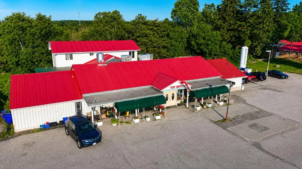 Top Notch Motel and Restaurant with its bright red roof and main entrance